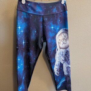 Knee-length space cat leggings